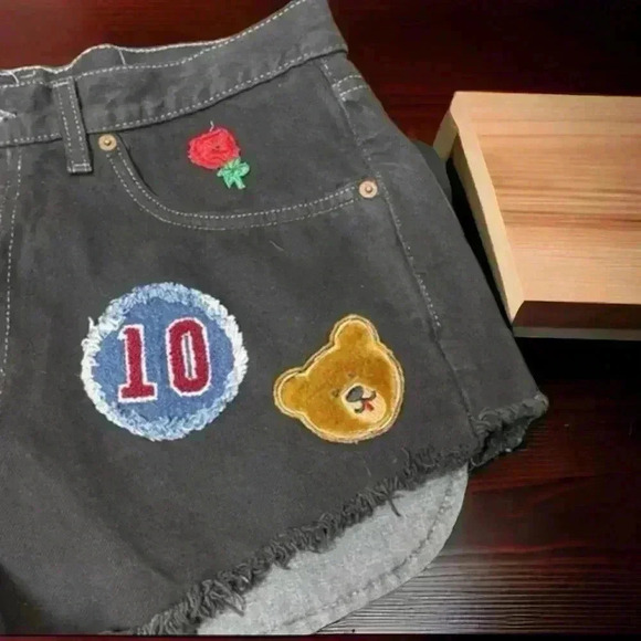 Levi's Women's Black Denim Shorts With Embellishments. 32" waist, 2.5" Iengrh - Picture 3 of 5